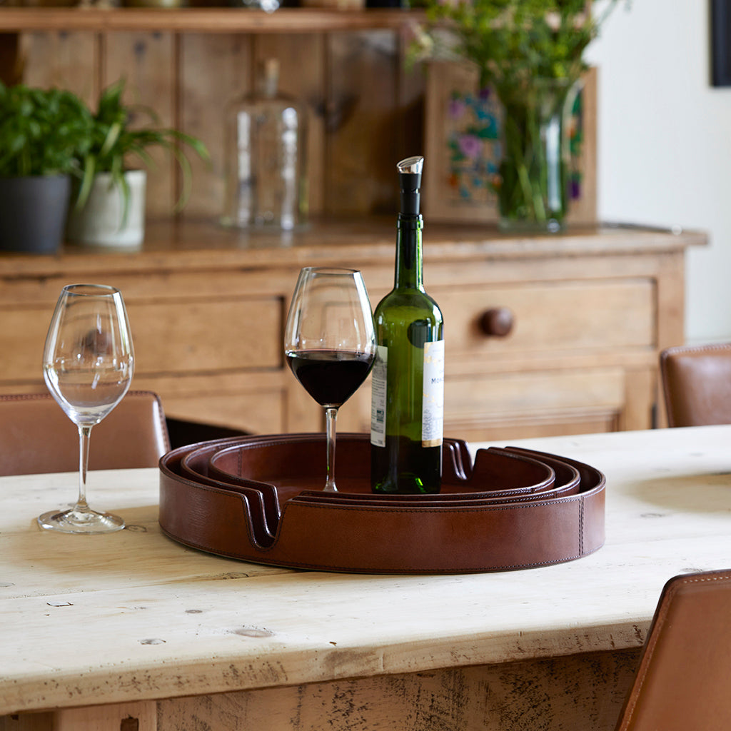 Set of three leather trays