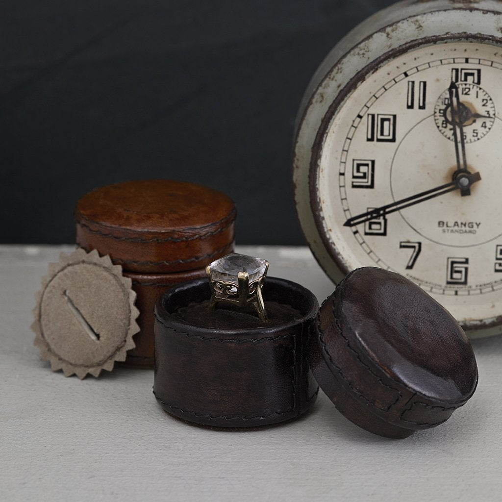 Tiny leather ring box with ring insert